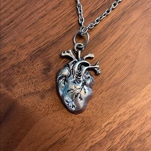 Show your heart, literally, with this fun silver heart necklace!